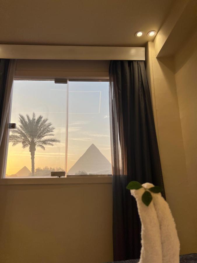 Blue Scarab Pyramids View Hotel Cairo Exterior photo