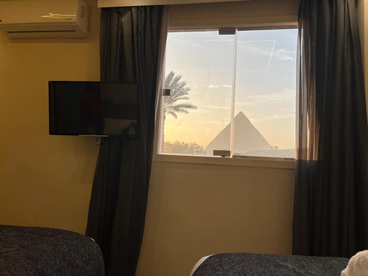 Blue Scarab Pyramids View Hotel Cairo Exterior photo